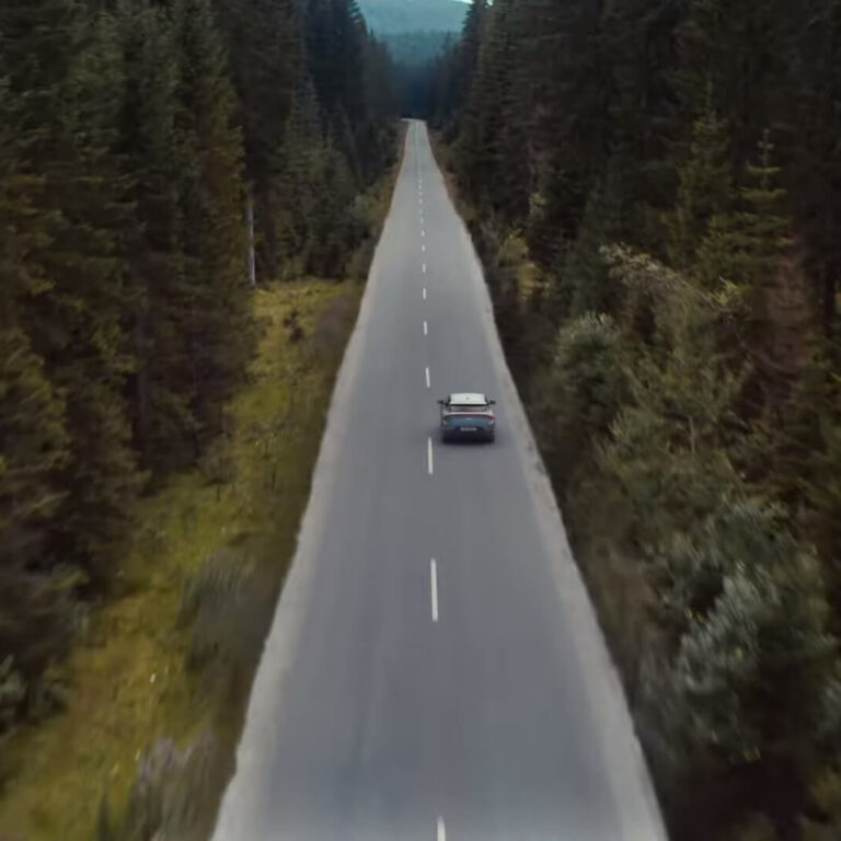Kia electric crossover teased in ad promoting the company’s rebranding